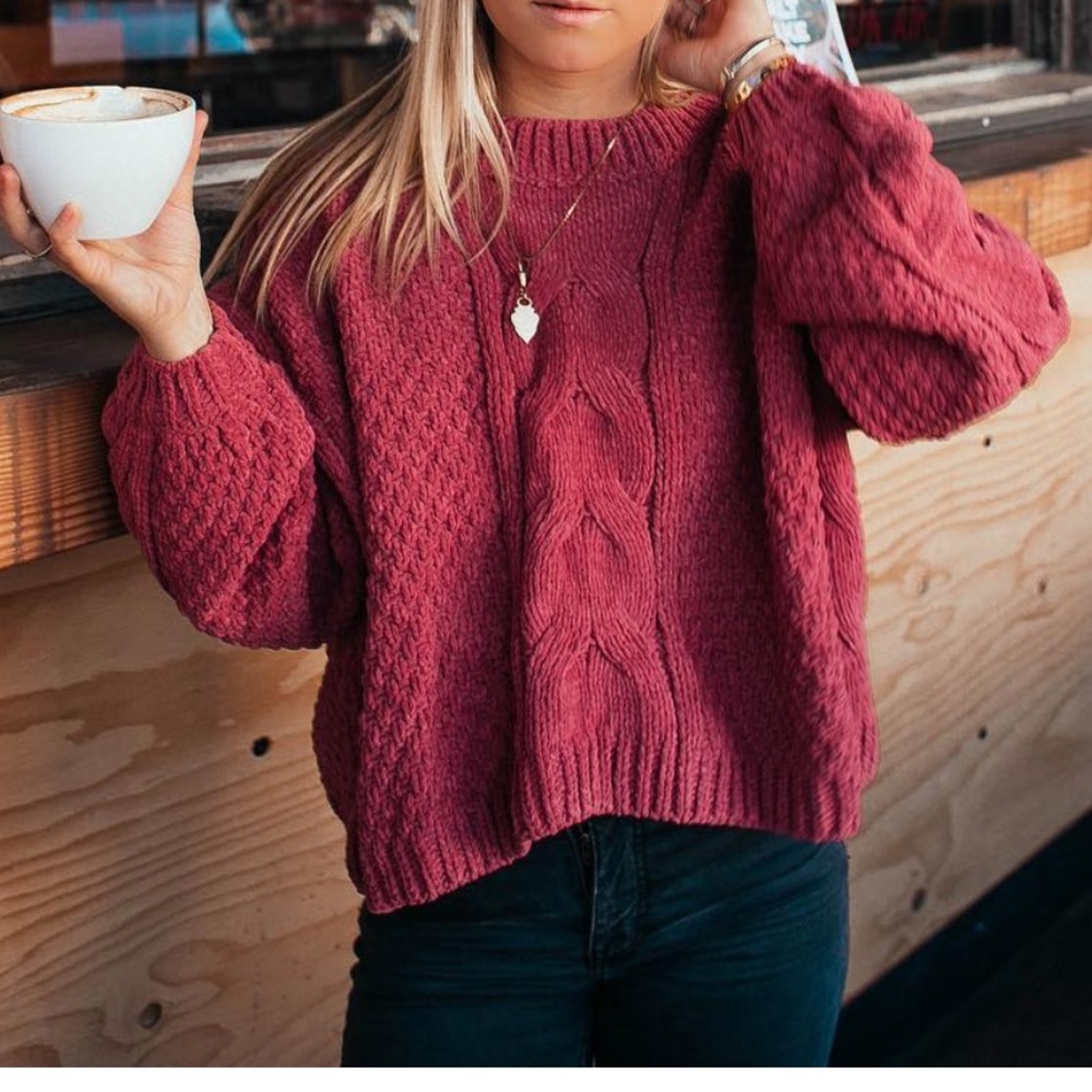 Cropped cable knit sweater